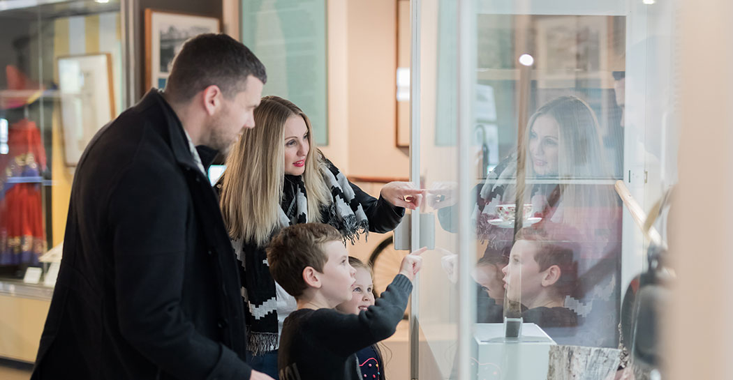 Family browsing exhibitions at the Museum of the Riverina Botanic Gardens site in Wagga Wagga